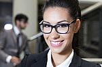 Cute Smiling Business Female Holding A Cell Phone Stock Photo