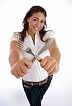 Cute Teenager Showing Cutlery Stock Photo