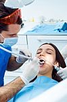 Cute Young Woman At The Dentist. Mouth Checkup Stock Photo