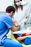 Cute Young Woman At The Dentist. Mouth Checkup Stock Photo