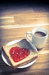 Delicious Slice Of Bread With Strawberry Jam Heart Shape Stock Photo