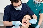 Dentist Examining His Patient Stock Photo