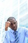 Depressed Businessman At Outdoors Stock Photo