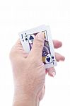 Detail Of Man Looking At Playing Cards Stock Photo