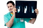 Disappointed Surgeon After Seeing X-ray Report Stock Photo