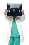 Doctor Holding X Ray Stock Photo