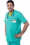 Doctor Sstanding With Hands On Waist Stock Photo