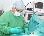 Doctor Starting A Surgery Stock Photo