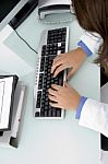 Doctor's Hand On Keyboard Stock Photo