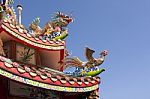 Dragon And Phoenix On The Temple Roof Stock Photo