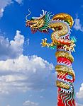 Dragon Statue With The Blue Sky Field Stock Photo