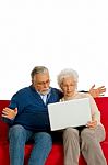 Elderly Couple With Laptop Stock Photo