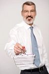 Elderly Man Showing Shopping Cart Stock Photo