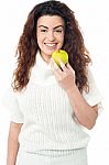 Elegant Woman Holding Fresh Green Apple Stock Photo