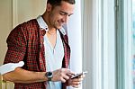 Elegant Young Handsome Man With Mobile Phone Stock Photo