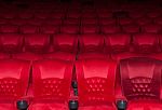 Empty Comfortable Red Seats In Thearter Stock Photo