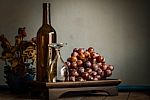 Empty Glass And Grapes On Tray Stock Photo