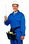 Engineer Holding Measuring Tape Stock Photo