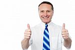 Entrepreneur Showing Double Thumbs Up Stock Photo