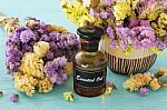 Essential Oil With Flower Stock Photo