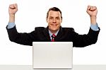 Excited Businessman Celebrating Success Stock Photo