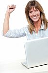 Excited Businesswoman Celebrating Her Success Stock Photo