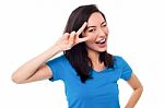 Excited Girl Doing Victory Sign On Eye Stock Photo