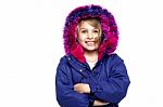 Excited Young Girl In Winter Wear Stock Photo