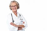 Experienced Lady Doctor With Stethoscope Stock Photo
