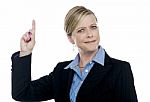 Expressive Businesswoman With Pointing Finger Stock Photo