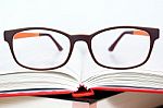 Eyeglasses Closeup With Book Stock Photo