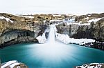 Fantastic Waterfall Hidden Among Mountains Stock Photo