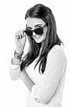 Fashion Girl Adjusting Her Shades Stock Photo