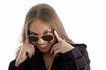 Fashion Woman Peeping Over Sunglasses Stock Photo