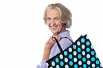 Fashionable Old Lady With Shopping Bag Stock Photo