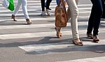 Feet On The Pedestrian Crossing Stock Photo