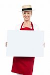 Female Chef Holding Blank Board Stock Photo