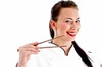 Female Chef Holding Chopsticks Stock Photo