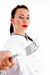 Female Chef Holding Fork Stock Photo