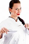 Female Chef Holding Fork And Knife Stock Photo