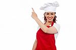 Female Chef showing Pointing Up Stock Photo