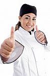 Female Chef Showing Thumbs Up Stock Photo