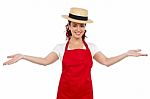 Female Chef Showing Welcome Gesture Stock Photo