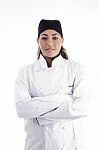 Female Chef With Crossed Arms Stock Photo