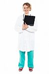 Female Doctor Holding Clipboard Stock Photo