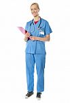 Female Doctor In Blue Medical Suit Stock Photo