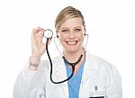 Female Doctor Showing Stethoscope Stock Photo