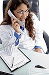 Female Doctor Talking On Phone Stock Photo