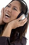 Female Enjoying Headphone Stock Photo