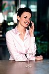 Female Entrepreneur In Middle Of Conversation Stock Photo